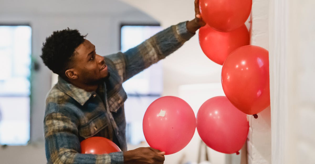 What's the special red resource required to forge the Shard of Icarael? - Positive black guy decorating wall with colorful balloons