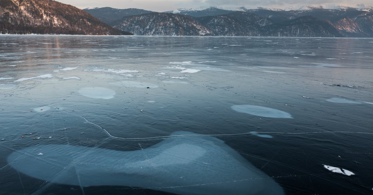 What's the surface area/ size of the planets in No Man's Sky? Are they different sizes? - Picturesque mountains and icy lake with blots on surface What's the surface area/ size of the planets in No Man's Sky? Are they different sizes? - Picturesque mountains and icy lake with blots on surface