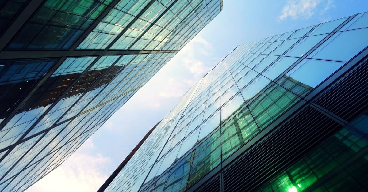 What's the tallest Large Underworld possible? - Low-angle Photography of Two Green Curtain Buildings