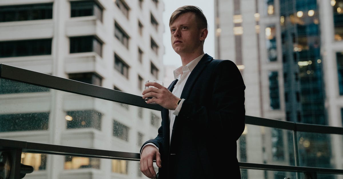 What abilities are available to a Leader from the Leader mod? - Serious businessman standing near glass fence