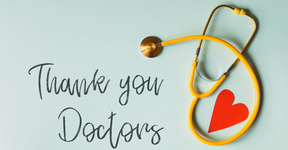 What abilities can I use to protect my team from a Junkrat ultimate? - From above arrangement of yellow stethoscope with red heart shape placed on blue background with THANK YOU DOCTORS inscription