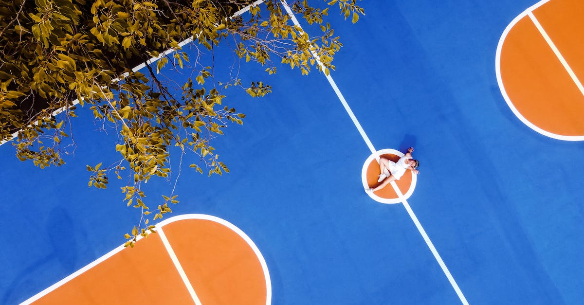 What actions/stats are affected by player height and weight? - Young woman resting on sports court What actions/stats are affected by player height and weight? - Young woman resting on sports court