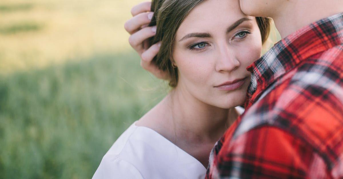 What affects the matchmaking? [duplicate] - Woman in Red and White Plaid Shirt Kissing Womans Cheek