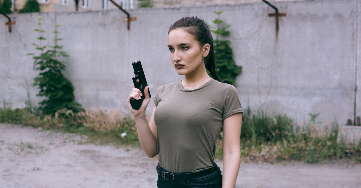 What are 'weapon proficiencies'? - Woman in White Crew Neck T-shirt Holding Black Smartphone