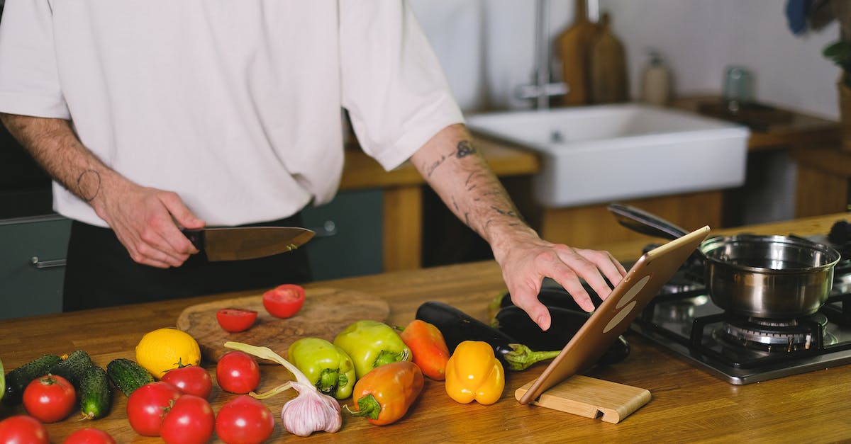 What are alchemy ingredients used for beyond the initial creation of a potion? - Man Using a Tablet While Cooking What are alchemy ingredients used for beyond the initial creation of a potion? - Man Using a Tablet While CookingÂ