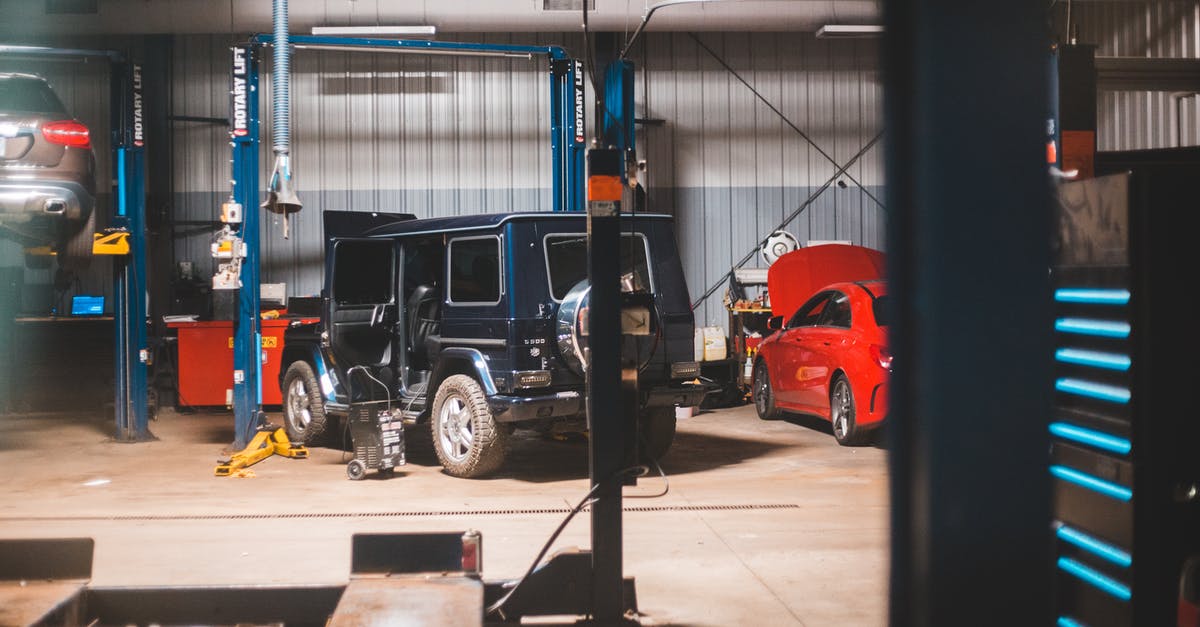 What are all the differences between Minutemen versus Brotherhood of Steel being in control of a location? - Modern automobile on repair in garage