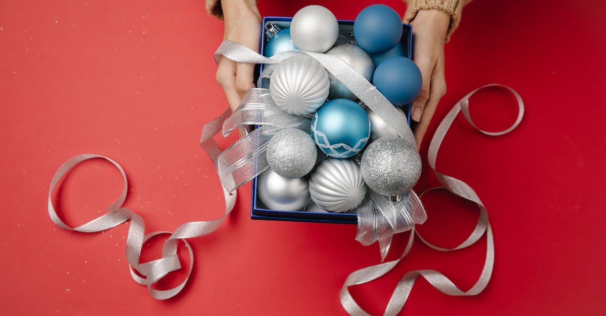 What are all the pokemon pearl ribbons? - Woman with box of Christmas hanging decorations