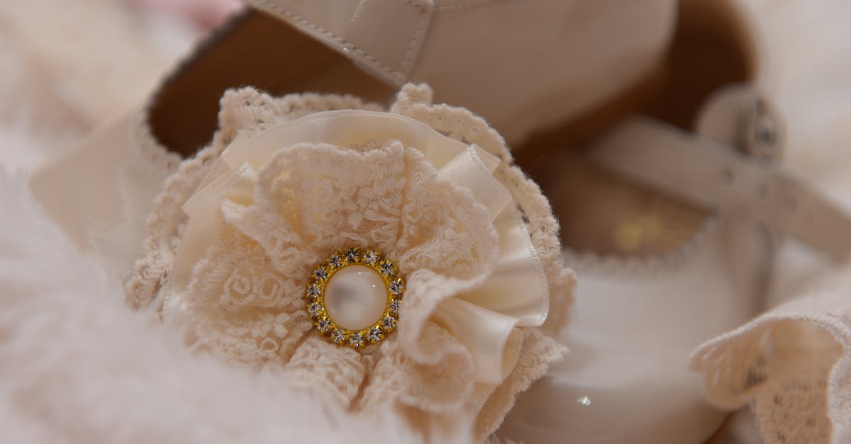 What are all the pokemon pearl ribbons? - Close-up Photo of White Lace Textile 