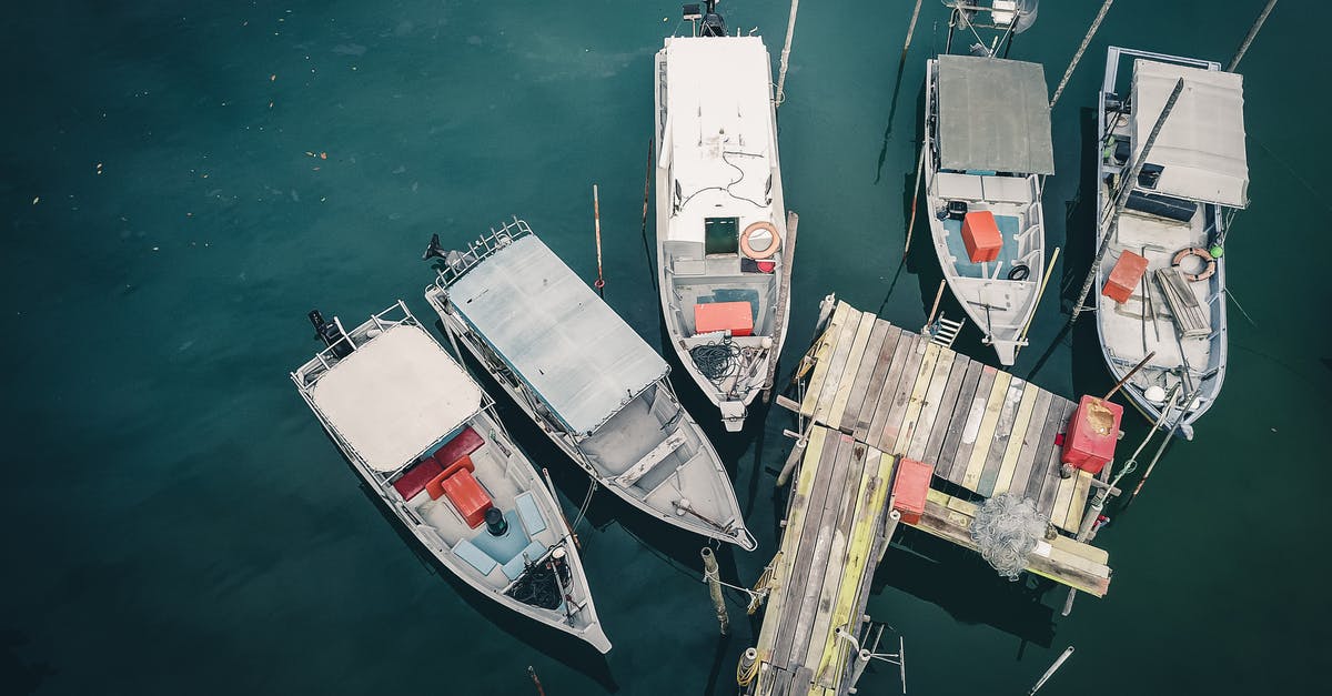 What are each region’s state fishing records that I have to beat to unlock Old Betsy Fishing Rod? - Fishing motor boats near old pier on ocean