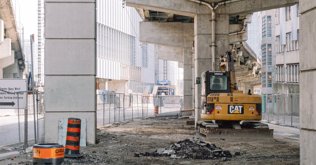 What are efficient ways of killing heavies quickly? - Site of roadway under concrete bridge construction with heavy equipment on dirty ground What are efficient ways of killing heavies quickly? - Site of roadway under concrete bridge construction with heavy equipment on dirty ground