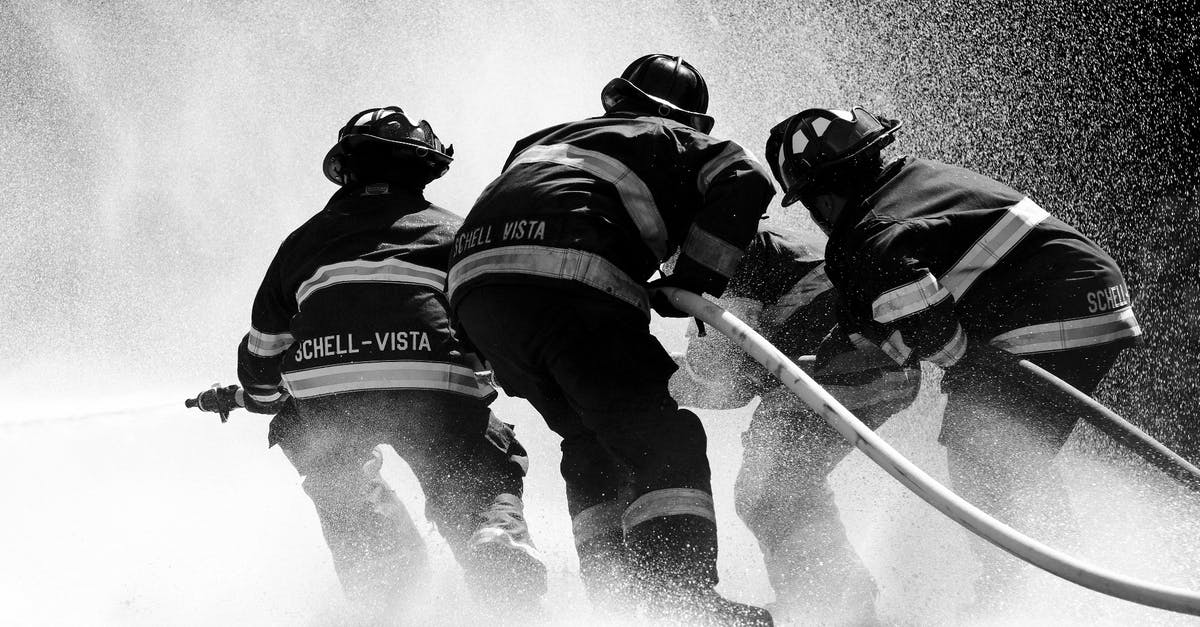 What are fire groups and how do I use them? - Grayscale Photo of Firemen