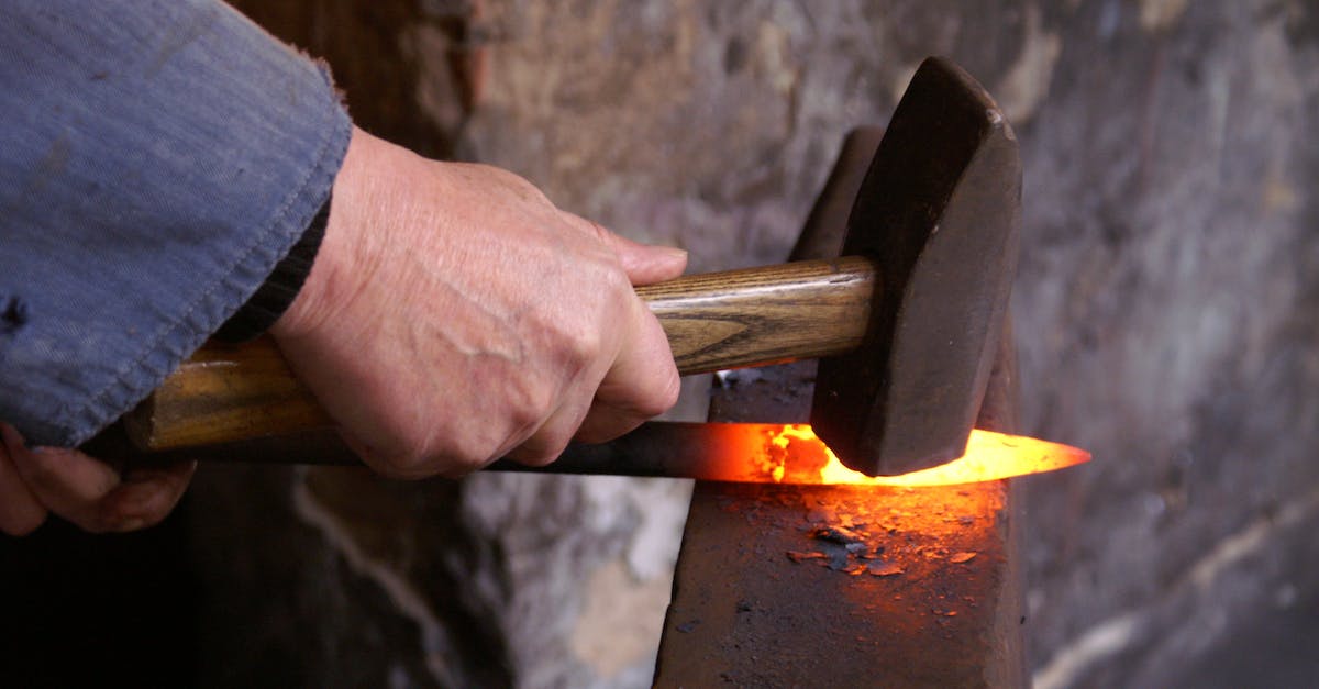 What are forge cores in Clicker Heroes? - Person Holding Forging Metal