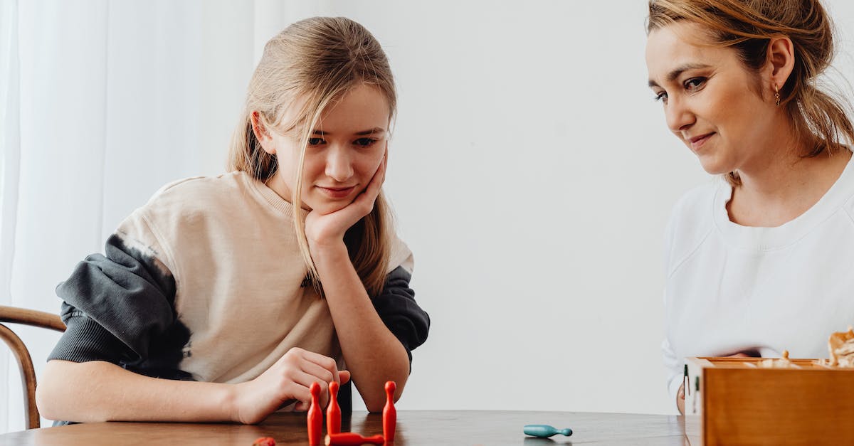 What are Mechanics and Takedowns at the end of game statictics table of Heroes of the storm? - Mother and Daughter Playing Game on Table What are Mechanics and Takedowns at the end of game statictics table of Heroes of the storm? - Mother and Daughter Playing Game on Table