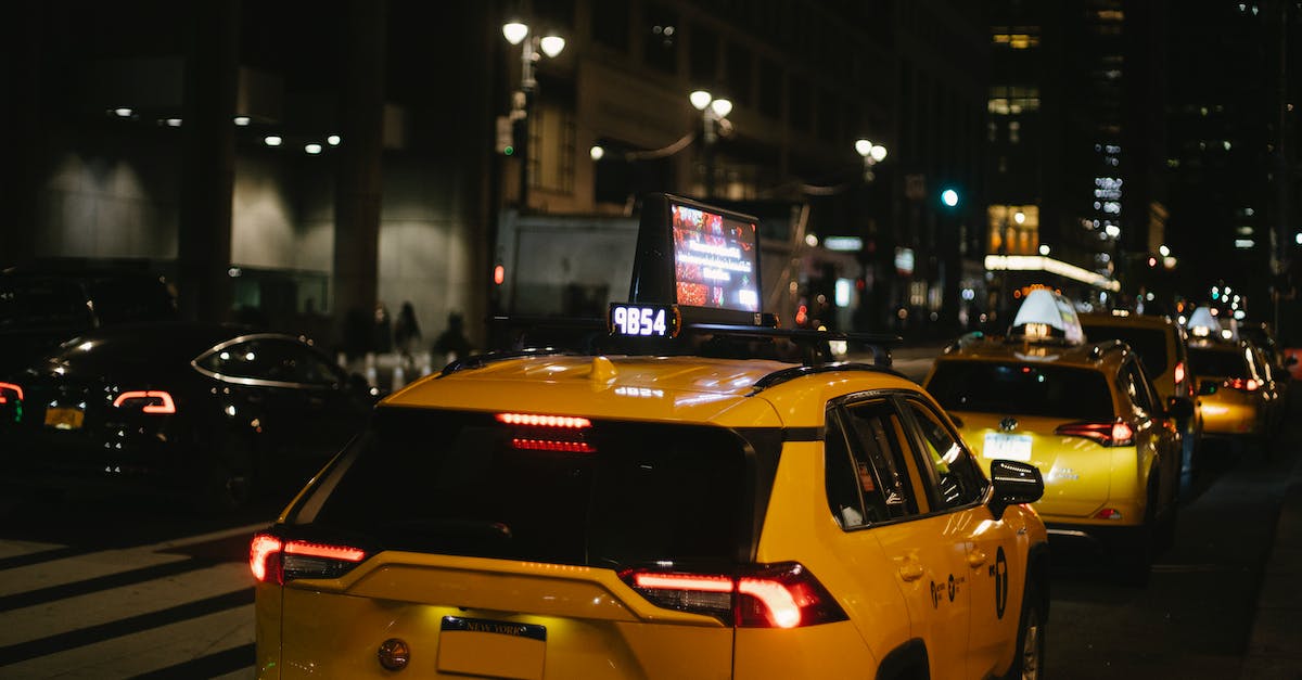 What are some of the ways to increase the Respectable quality? - Hatchback taxis driving on city street at night