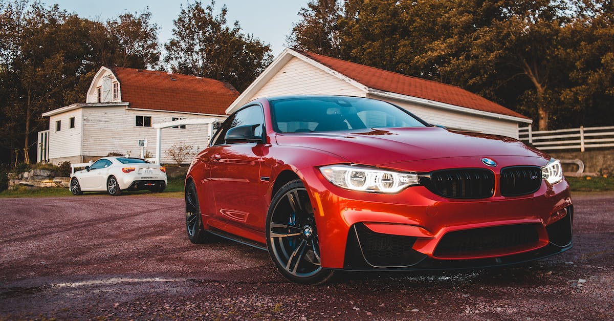 What are some of the ways to increase the Respectable quality? - Trendy red car parked near typical cottage in countryside