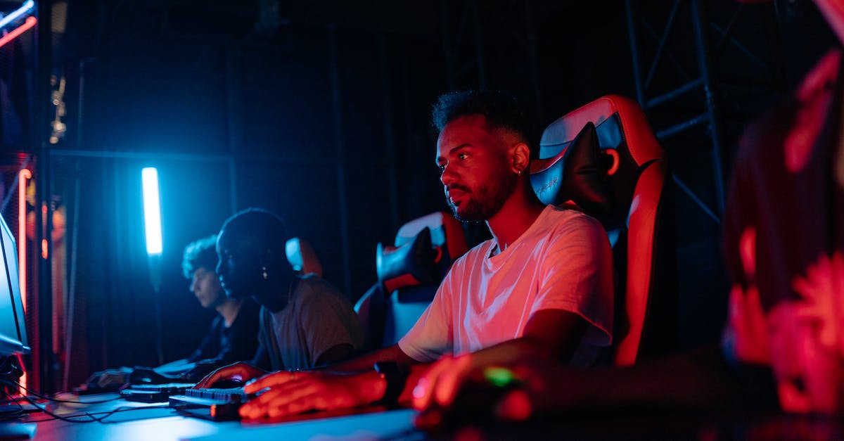 What are the advantages/disadvantages of having high mouse sensitivity in Moba games when playing skill-shot based characters? - Group of People Playing Computer