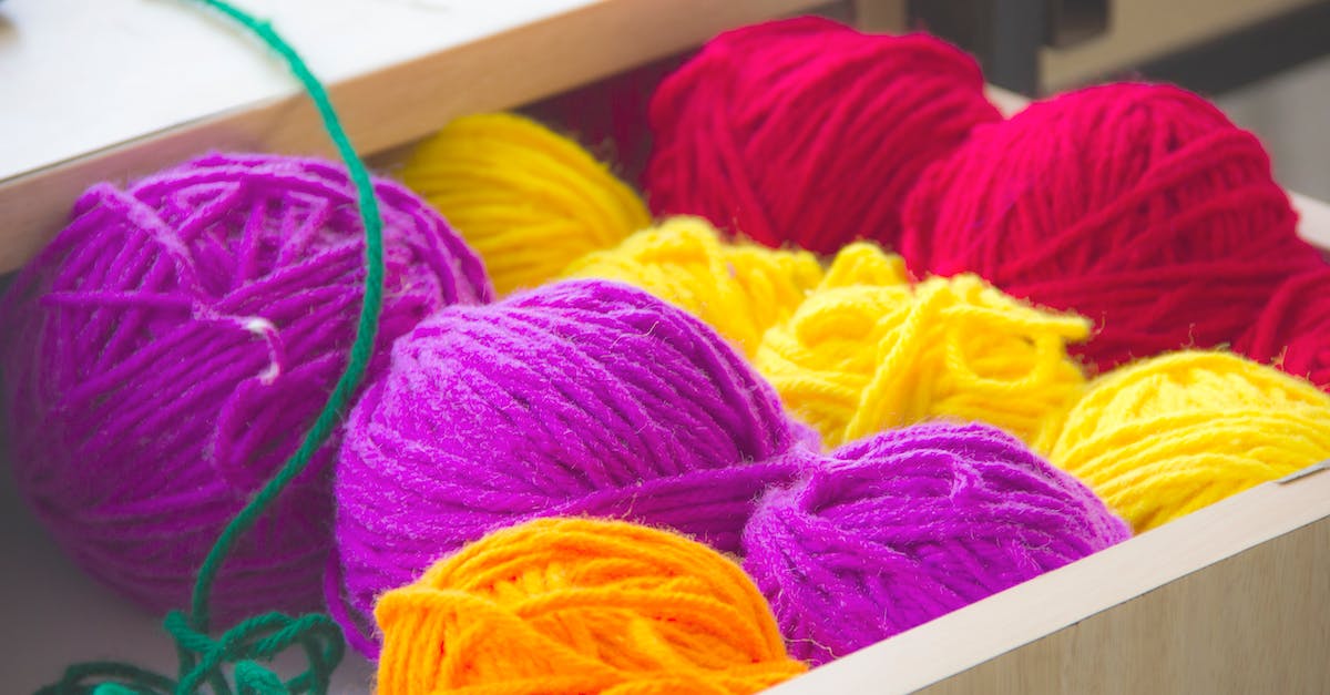 What are the balls of yarn for? - Close-up Photography of Colorful Yarns