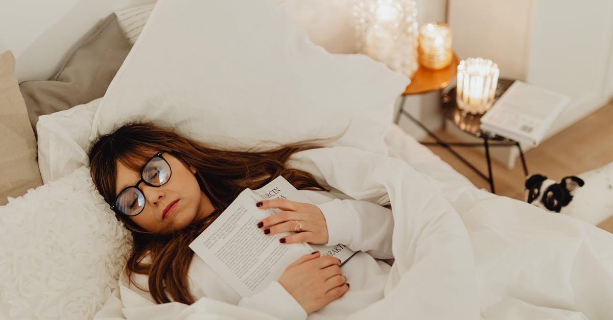What are the benefits and drawbacks of sleeping? - Woman in White Robe Reading Book