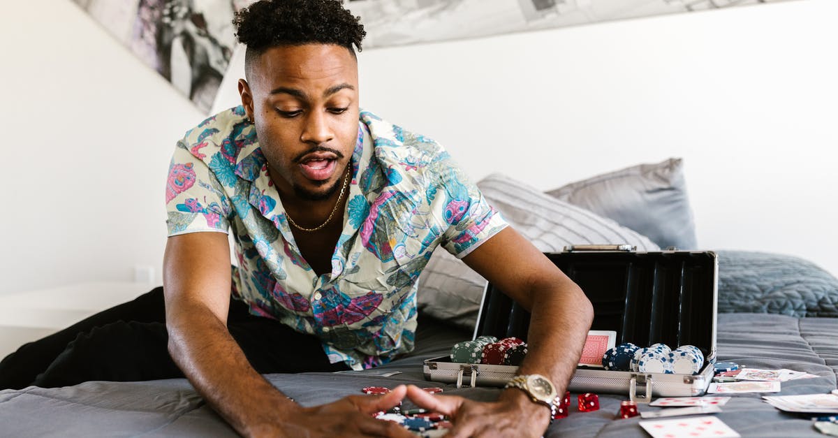 What are the chances of getting a legendary card? - Man in Printed Shirt Getting Poker Chips What are the chances of getting a legendary card? - Man in Printed Shirt Getting Poker Chips