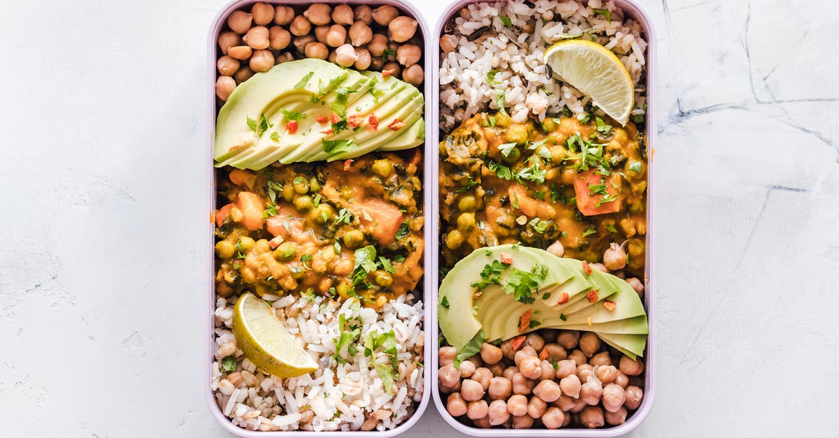 What are the chances of the lunchbox contents? - Flat Lay Photography of Two Tray of Foods What are the chances of the lunchbox contents? - Flat Lay Photography of Two Tray of Foods
