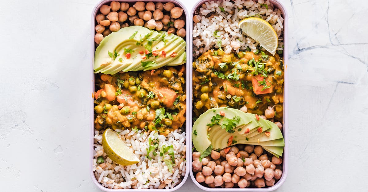 What are the chances of the lunchbox contents? - Flat Lay Photography of Two Tray of Foods