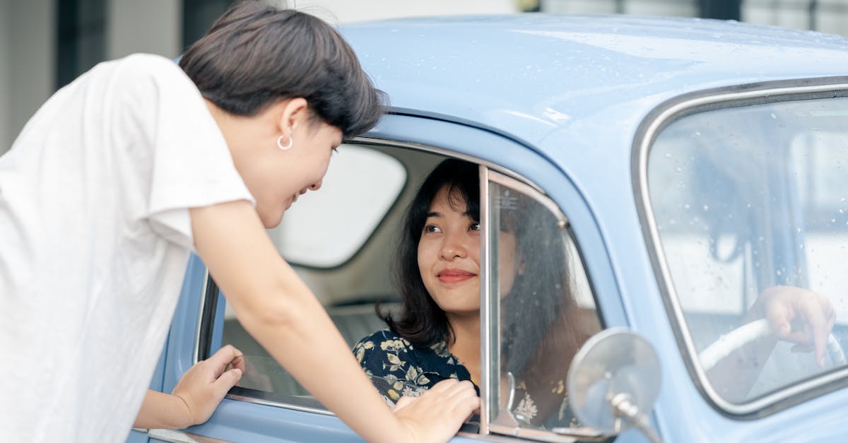 What are the closest systems in each major region to the Jita system? - Photo of Woman Inside the Car While Looking at Her Boyfriend