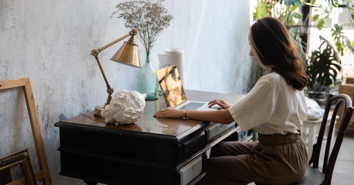 What are the common sub-categories of computer RPG? - Woman in White Shirt Sitting on Chair Reading Book