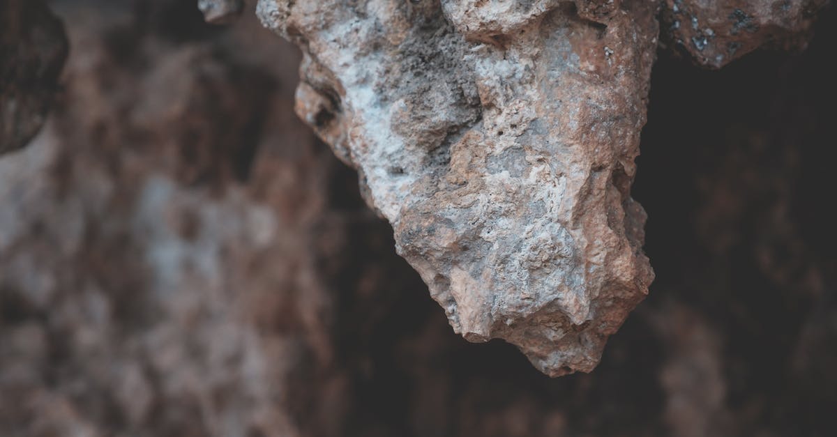 What are the damage Sharpness modifiers in MH4U? - Heavy textured piece of stone on uneven formation on rocky cave in daytime