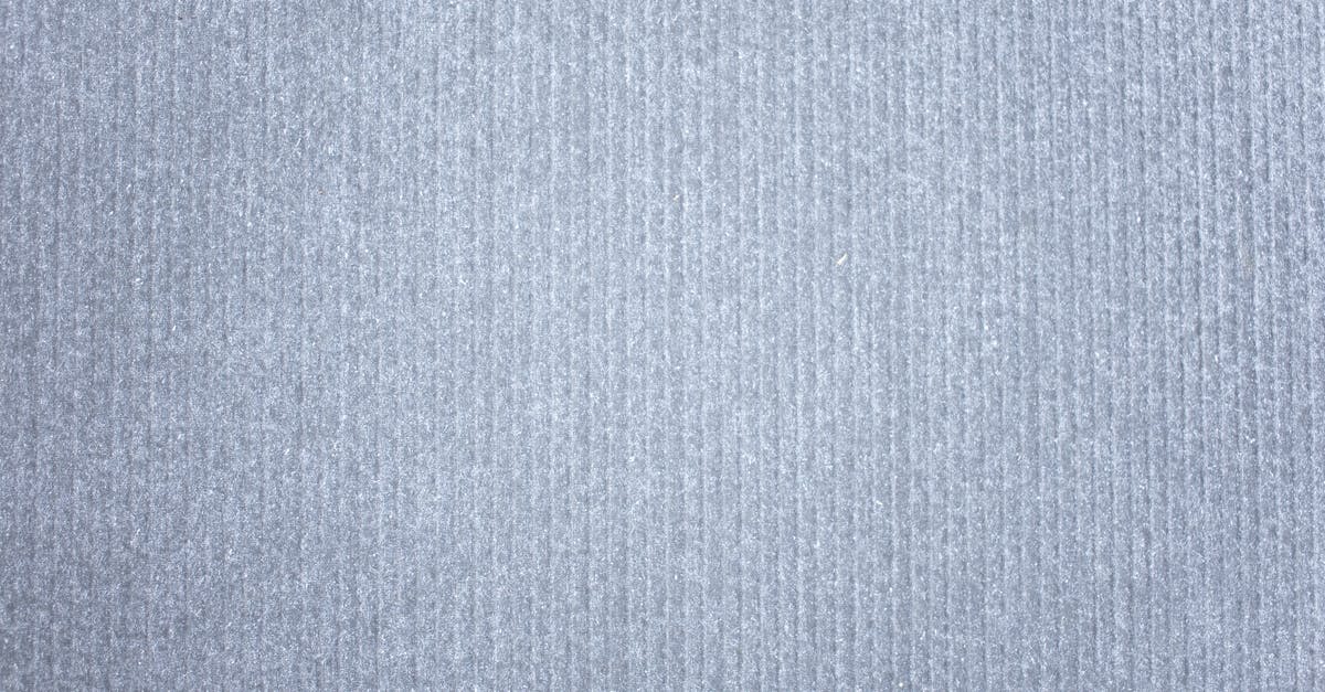What are the differences between regular and Hardcore? - Gray abstract background with linear pattern