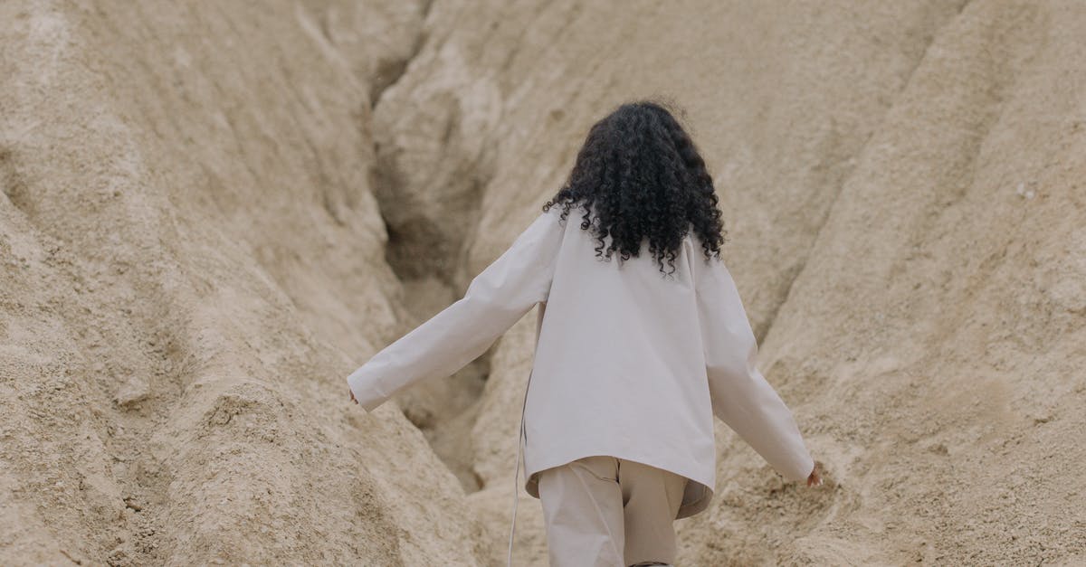 What are the differences between the difficulties? - Person in White Long Sleeve Shirt Walking Between Brown Rough Walls