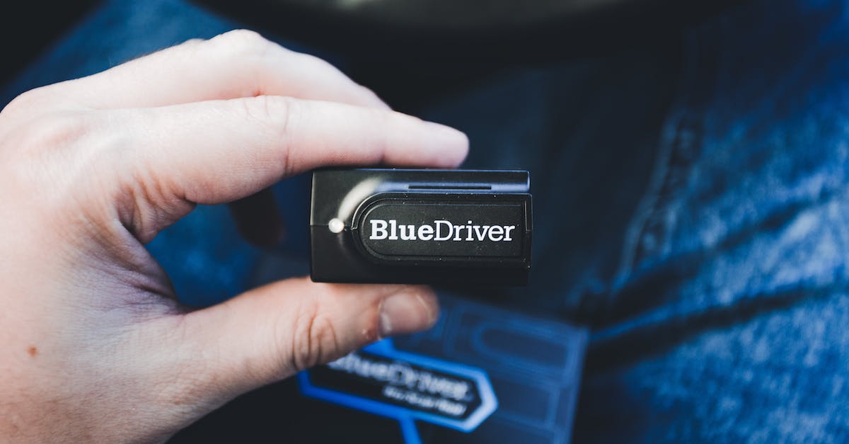 What are the differences between the Wireless Scanner vs Emitter? - A Person Holding a Car Diagnostic Scanning Device What are the differences between the Wireless Scanner vs Emitter? - A Person Holding a Car Diagnostic Scanning Device