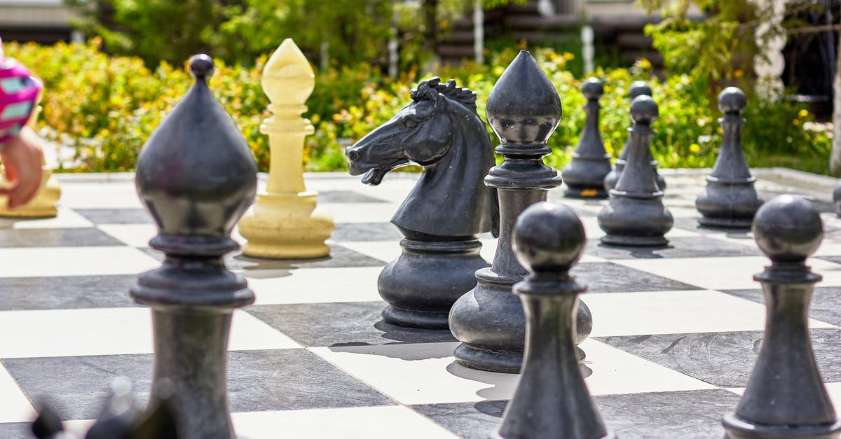 What are the exact requirements to unlock the IV checker NPC at the Battle Tree? - Giant chess set with figures and checkered board placed on ground in garden on sunny day