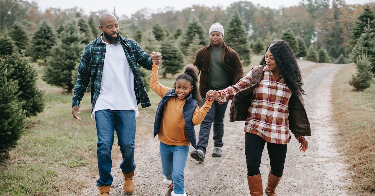 What are the final preparations for a Dungeon farm before killing Plantera? - Smiling ethnic family walking on tree farm road What are the final preparations for a Dungeon farm before killing Plantera? - Smiling ethnic family walking on tree farm road
