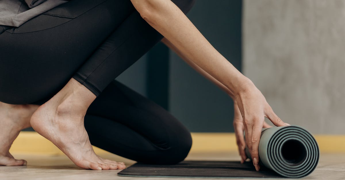 What are the fitting skills? - Woman Unrolling A Yoga Mat What are the fitting skills? - Woman Unrolling A Yoga Mat