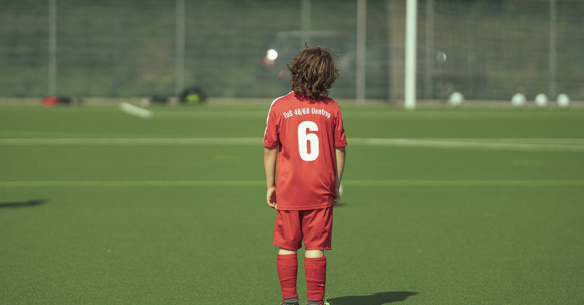 What are the Game Boy Advance (GBA) Game Pak ROM cartridge physical dimensions (length x width x height)? - Faceless teenage boy football player standing on field