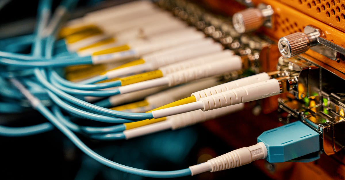 What are the Highest Density Components? - Fiber optic switch with bright connectors in studio What are the Highest Density Components? - Fiber optic switch with bright connectors in studio