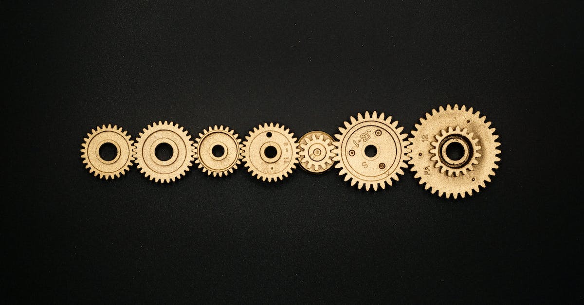 What Are The Mechanics For Attack-Move - Photo of Golden Cogwheel on Black Background