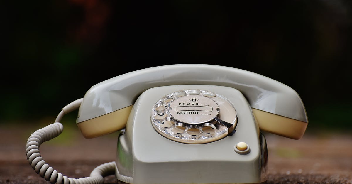 What are the most common Vault numbers in Fallout Shelter? [closed] - Gray Rotary Telephone on Brown Surface