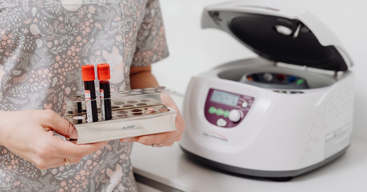 What are the NPC Blood Vials meant to be used for? - Woman in White and Red Floral Dress Holding White and Black Digital Weighing Scale