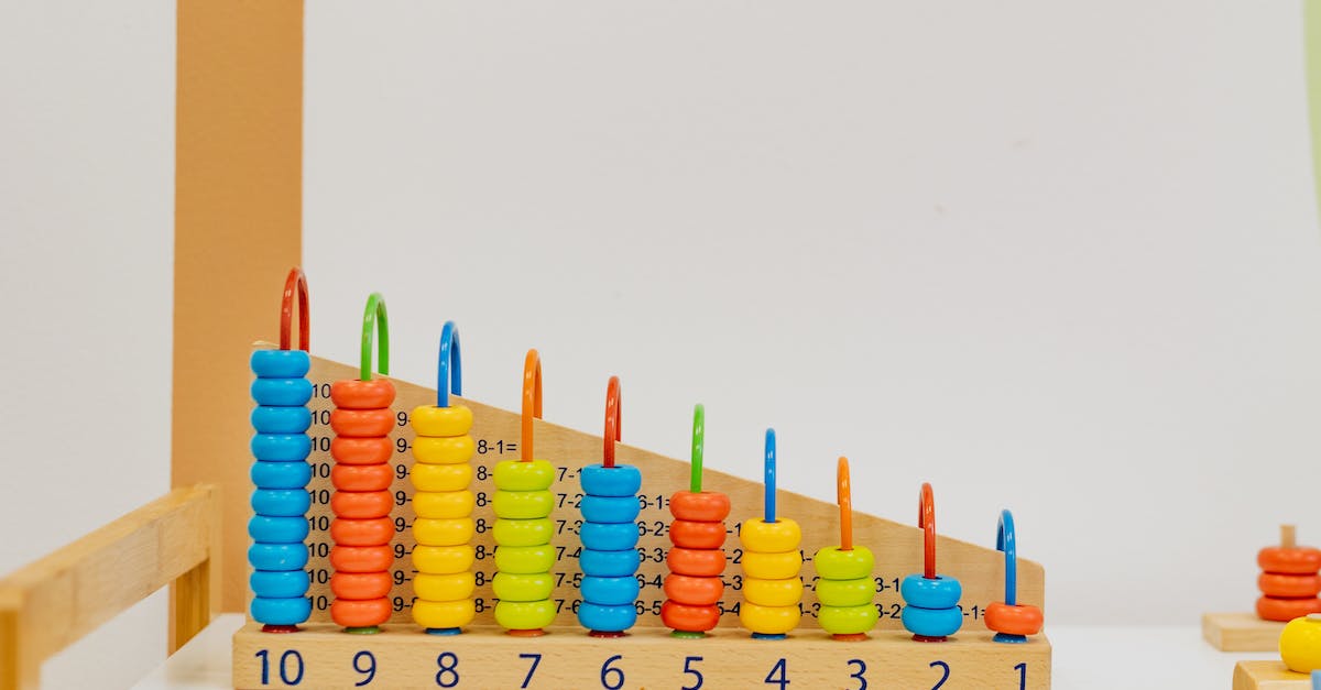 What are the numbers on the character descriptions? - Free stock photo of abacus, business, child