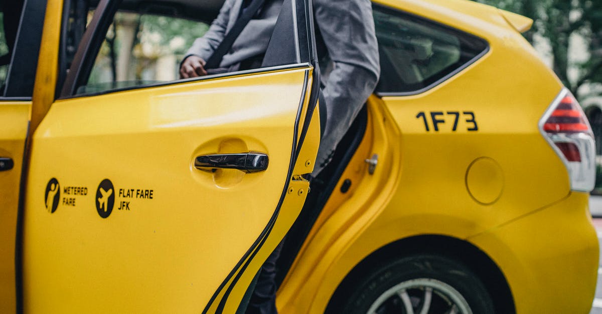 What are the passenger bonus numbers? - Black man in elegant suit opening door of yellow taxi