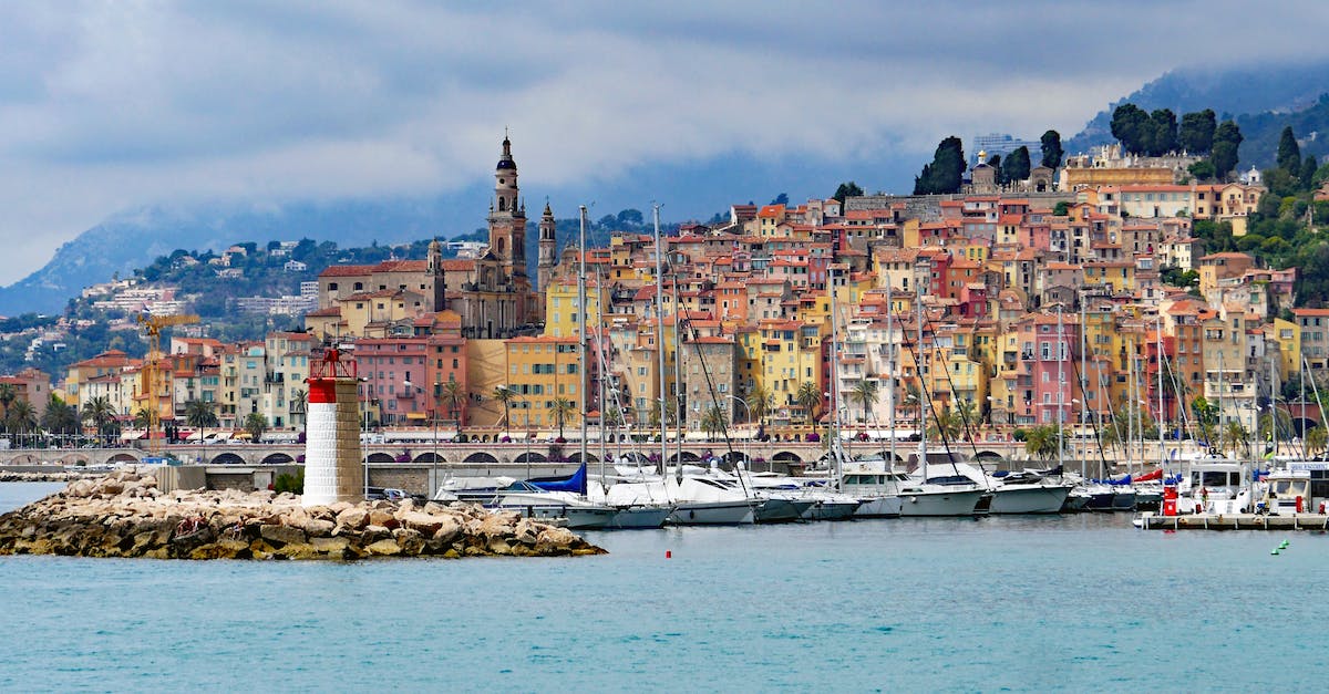 What are the ports of Age of Mythology: Extended Edition? - Houses Near With Sea With Sailboats and Lighthouse during Daytime