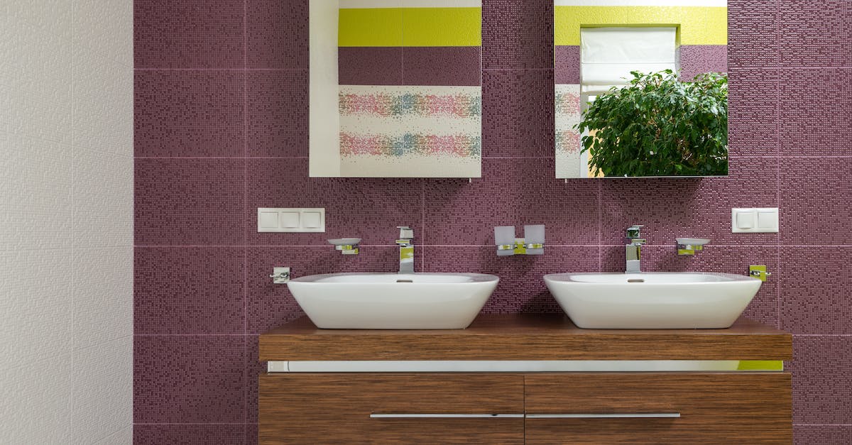 What are the purple tiles? - Interior of bathroom with colorful wall