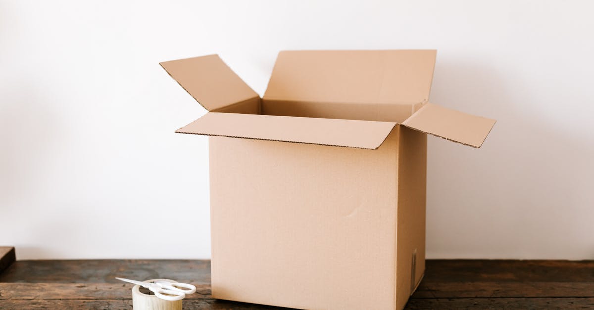 What are the requirements to obtain the purchasable house? - Opened cardboard container placed on old wooden desk near tape and scissors before relocation against white wall What are the requirements to obtain the purchasable house? - Opened cardboard container placed on old wooden desk near tape and scissors before relocation against white wall