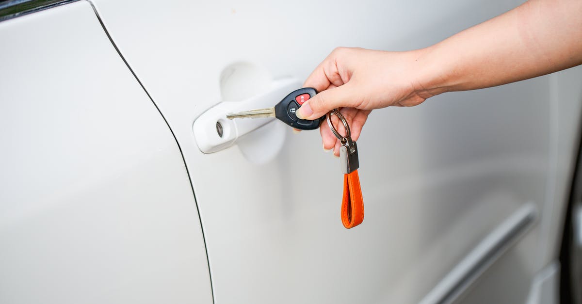 What are the requirements to unlock a specialisation? - A Person Holding a Car Key Near a Car Door What are the requirements to unlock a specialisation? - A Person Holding a Car Key Near a Car Door