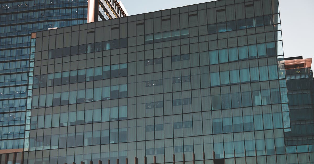 What are the role of prestige points in Sky Force Reloaded? - Prestige building with glass facade in daytime