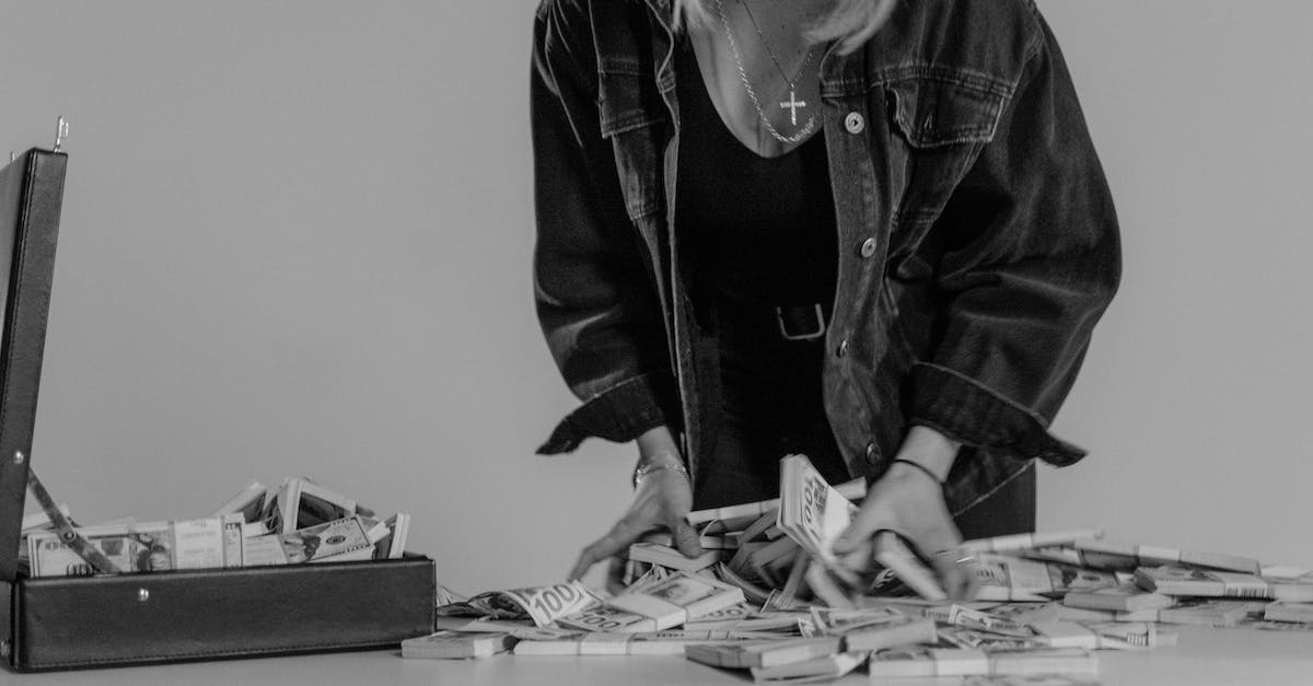 What are the weaknesses of the Miracle Rogue deck? - Monochrome Photo of Person Holding Bundles of Cash Money