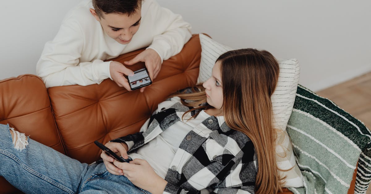 What are the x, y, and z in the /testforblocks command? - Teenage Couple Using Their Smart Phones 
