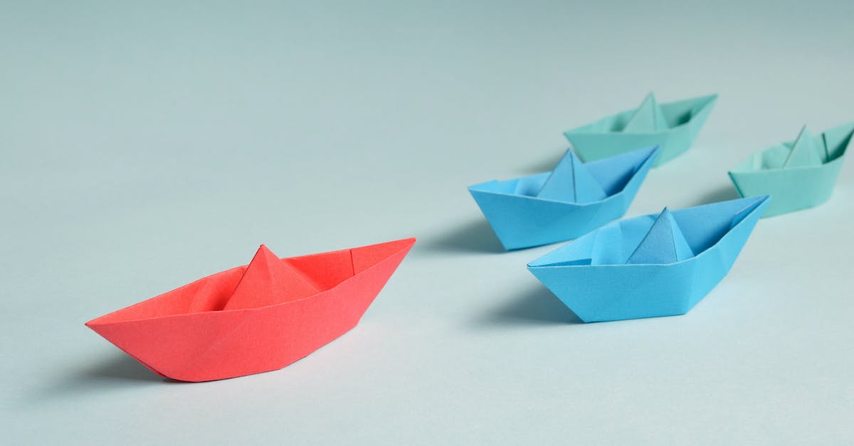 What are these red triangle-shaped things? - Paper Boats on Solid Surface What are these red triangle-shaped things? - Paper Boats on Solid Surface