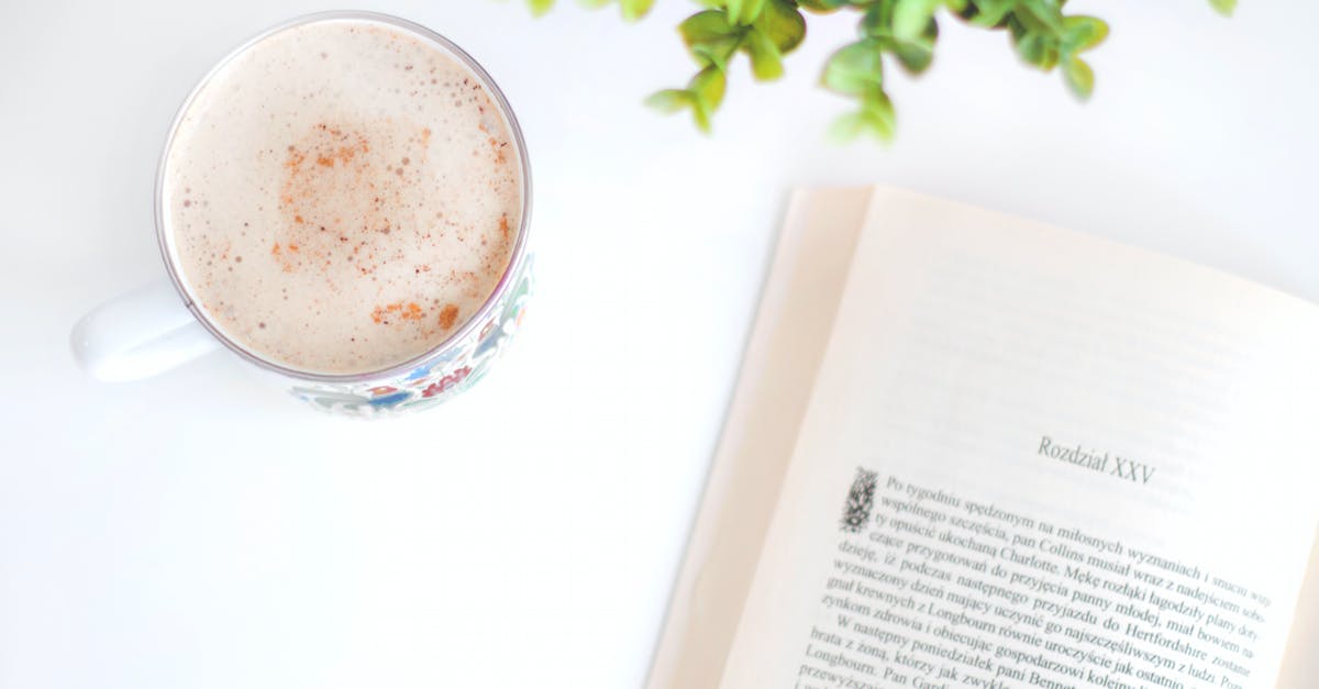 What are they singing on the Hot Top Volcanco soundtrack? - Flatlay Photography of Book and Cup What are they singing on the Hot Top Volcanco soundtrack? - Flatlay Photography of Book and Cup